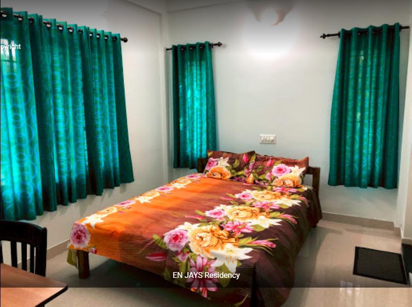 En Jays Residency Apartment Kottayam Bagian luar foto